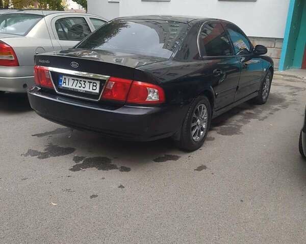 Киа Маджентис 2004 в Белой Церкве на Automoto.ua Черный Киа Маджентис, объемом двигателя 2 л и пробегом 200 тыс. км за 3000 $, фото 1 на Automoto.ua