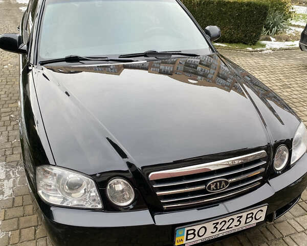 Чорний Кіа Маджентіс, об'ємом двигуна 2 л та пробігом 118 тис. км за 5300 $, фото 1 на Automoto.ua