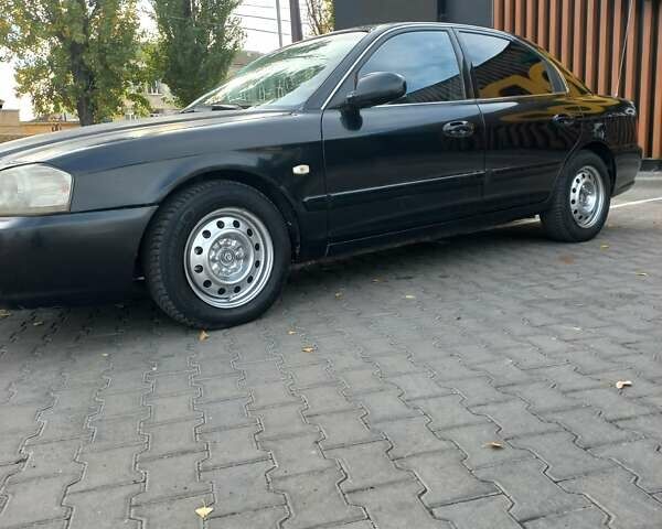 Черный Киа Маджентис, объемом двигателя 1.99 л и пробегом 195 тыс. км за 3200 $, фото 1 на Automoto.ua