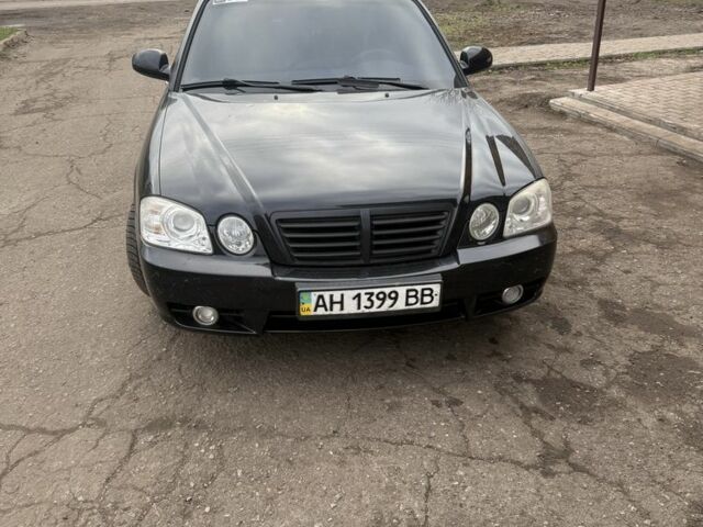 Чорний Кіа Маджентіс, об'ємом двигуна 2 л та пробігом 270 тис. км за 3296 $, фото 1 на Automoto.ua