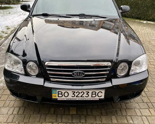 Чорний Кіа Маджентіс, об'ємом двигуна 2 л та пробігом 120 тис. км за 5800 $, фото 1 на Automoto.ua