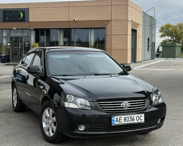 Чорний Кіа Маджентіс, об'ємом двигуна 2 л та пробігом 217 тис. км за 5999 $, фото 1 на Automoto.ua
