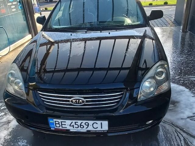 Черный Киа Маджентис, объемом двигателя 2 л и пробегом 180 тыс. км за 4800 $, фото 1 на Automoto.ua