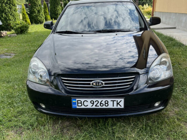 Чорний Кіа Маджентіс, об'ємом двигуна 2 л та пробігом 200 тис. км за 4650 $, фото 1 на Automoto.ua