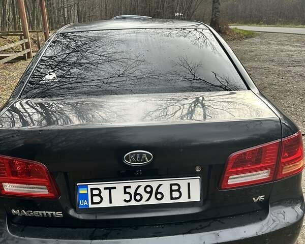 Чорний Кіа Маджентіс, об'ємом двигуна 2.66 л та пробігом 218 тис. км за 4600 $, фото 1 на Automoto.ua