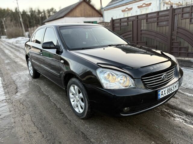 Черный Киа Маджентис, объемом двигателя 2 л и пробегом 390 тыс. км за 4800 $, фото 1 на Automoto.ua