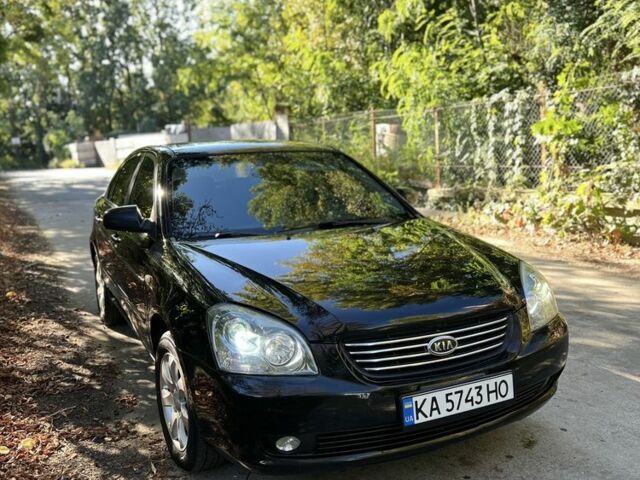 Чорний Кіа Маджентіс, об'ємом двигуна 2 л та пробігом 340 тис. км за 4600 $, фото 1 на Automoto.ua