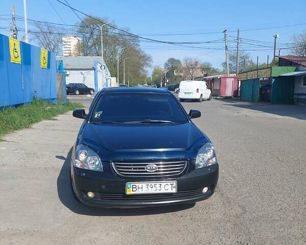 Черный Киа Маджентис, объемом двигателя 2 л и пробегом 320 тыс. км за 4599 $, фото 1 на Automoto.ua