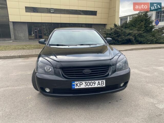 Черный Киа Маджентис, объемом двигателя 2 л и пробегом 299 тыс. км за 5200 $, фото 1 на Automoto.ua