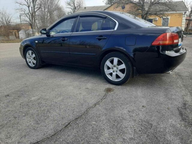 Чорний Кіа Маджентіс, об'ємом двигуна 2.7 л та пробігом 210 тис. км за 5300 $, фото 1 на Automoto.ua