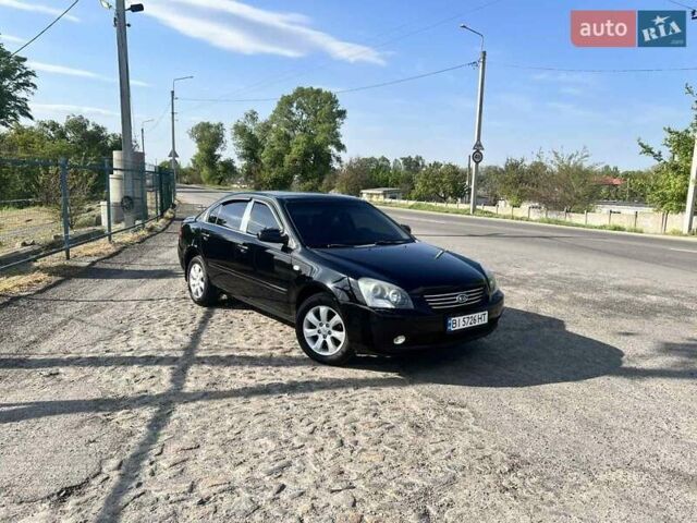 Черный Киа Маджентис, объемом двигателя 2 л и пробегом 188 тыс. км за 6999 $, фото 1 на Automoto.ua