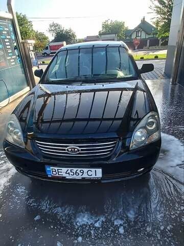 Черный Киа Маджентис, объемом двигателя 2 л и пробегом 180 тыс. км за 4900 $, фото 1 на Automoto.ua