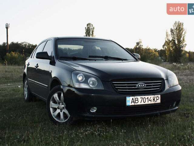 Чорний Кіа Маджентіс, об'ємом двигуна 2 л та пробігом 380 тис. км за 4600 $, фото 1 на Automoto.ua
