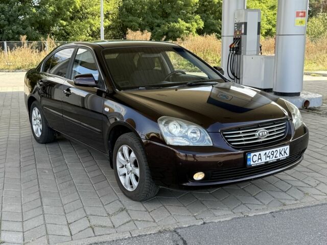 Чорний Кіа Маджентіс, об'ємом двигуна 2 л та пробігом 195 тис. км за 4450 $, фото 1 на Automoto.ua