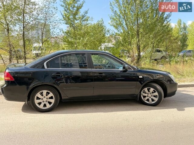 Чорний Кіа Маджентіс, об'ємом двигуна 2 л та пробігом 280 тис. км за 5300 $, фото 1 на Automoto.ua