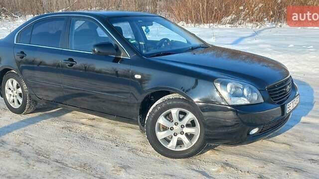 Чорний Кіа Маджентіс, об'ємом двигуна 2 л та пробігом 209 тис. км за 4800 $, фото 1 на Automoto.ua