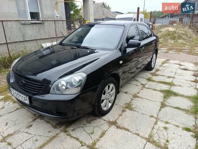 Чорний Кіа Маджентіс, об'ємом двигуна 2 л та пробігом 439 тис. км за 5400 $, фото 1 на Automoto.ua
