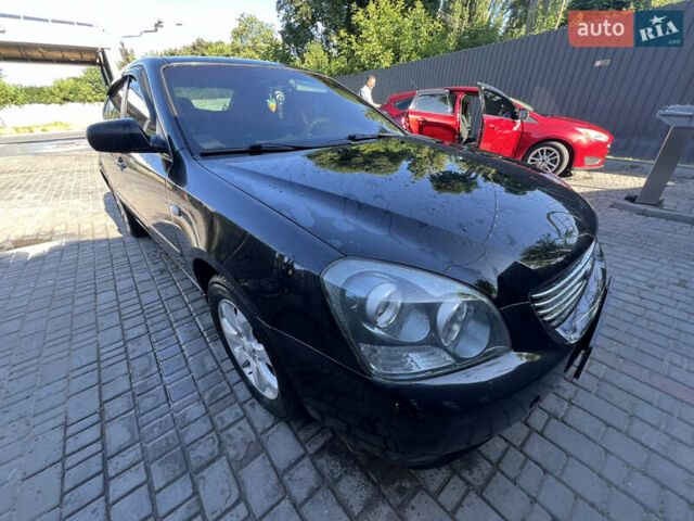 Чорний Кіа Маджентіс, об'ємом двигуна 2 л та пробігом 197 тис. км за 4700 $, фото 1 на Automoto.ua