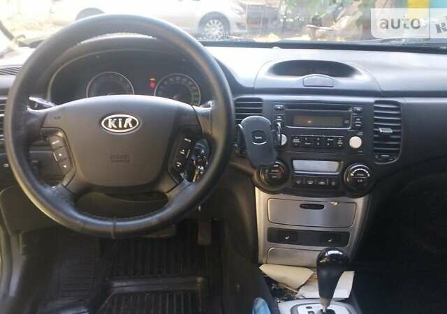 Черный Киа Маджентис, объемом двигателя 2 л и пробегом 274 тыс. км за 5500 $, фото 1 на Automoto.ua