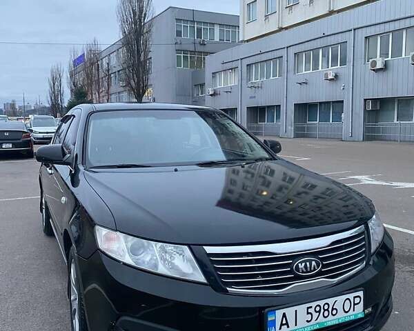 Черный Киа Маджентис, объемом двигателя 2 л и пробегом 208 тыс. км за 6400 $, фото 1 на Automoto.ua