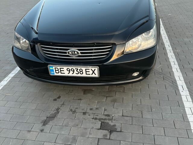 Черный Киа Маджентис, объемом двигателя 2 л и пробегом 317 тыс. км за 5200 $, фото 1 на Automoto.ua