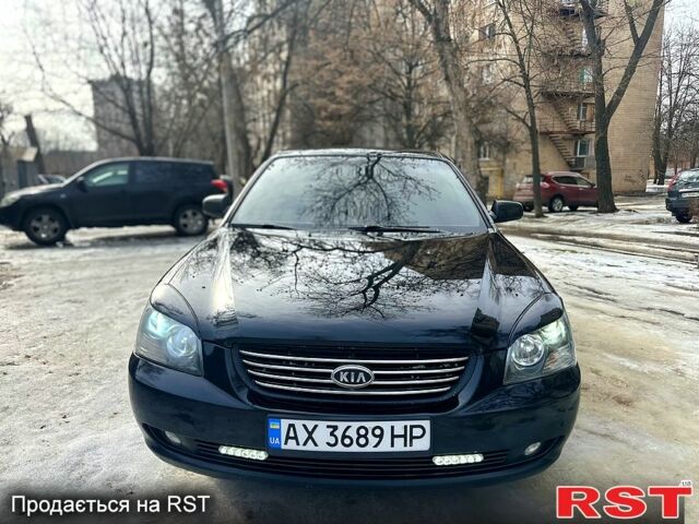 Чорний Кіа Маджентіс, об'ємом двигуна 2 л та пробігом 217 тис. км за 5800 $, фото 1 на Automoto.ua