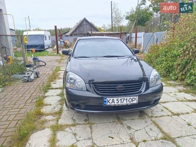 Черный Киа Маджентис, объемом двигателя 2 л и пробегом 439 тыс. км за 5400 $, фото 1 на Automoto.ua