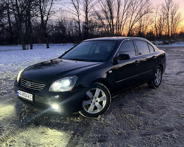 Черный Киа Маджентис, объемом двигателя 2.66 л и пробегом 307 тыс. км за 4800 $, фото 1 на Automoto.ua