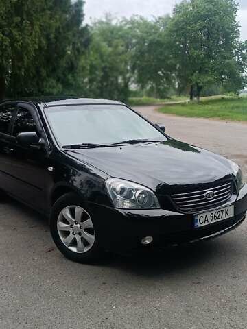 Черный Киа Маджентис, объемом двигателя 2 л и пробегом 262 тыс. км за 4700 $, фото 1 на Automoto.ua