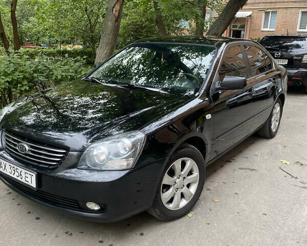 Чорний Кіа Маджентіс, об'ємом двигуна 2 л та пробігом 300 тис. км за 4550 $, фото 1 на Automoto.ua