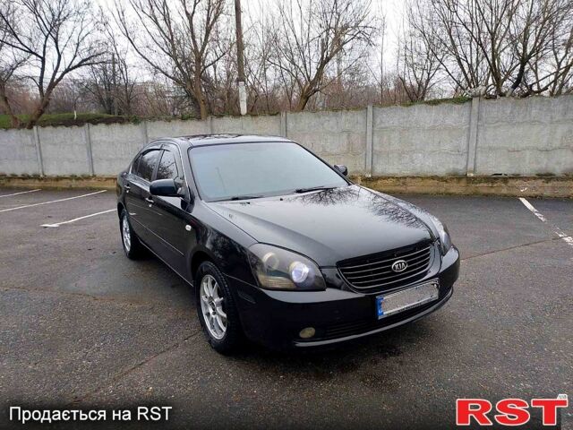 Черный Киа Маджентис, объемом двигателя 2 л и пробегом 270 тыс. км за 5150 $, фото 1 на Automoto.ua