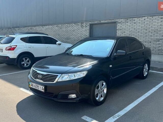 Чорний Кіа Маджентіс, об'ємом двигуна 2 л та пробігом 197 тис. км за 6500 $, фото 1 на Automoto.ua