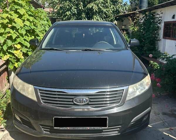 Чорний Кіа Маджентіс, об'ємом двигуна 2 л та пробігом 230 тис. км за 5300 $, фото 1 на Automoto.ua