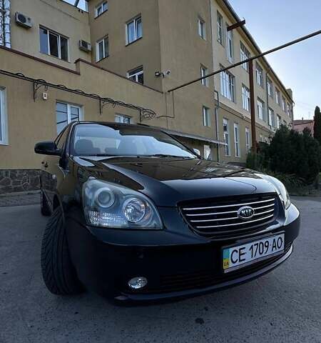 Чорний Кіа Маджентіс, об'ємом двигуна 2 л та пробігом 67 тис. км за 7300 $, фото 1 на Automoto.ua
