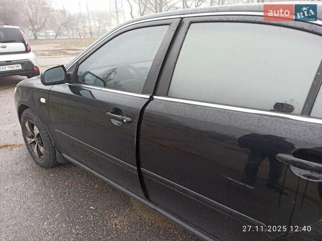 Черный Киа Маджентис, объемом двигателя 2 л и пробегом 226 тыс. км за 5500 $, фото 1 на Automoto.ua