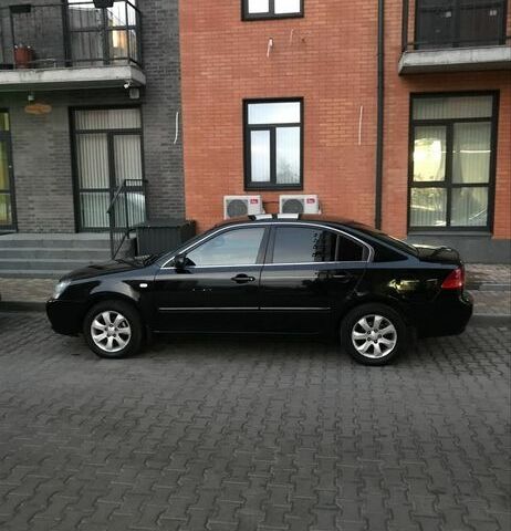 Чорний Кіа Маджентіс, об'ємом двигуна 2 л та пробігом 153 тис. км за 6015 $, фото 1 на Automoto.ua