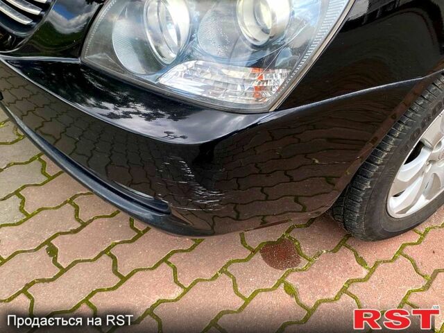 Чорний Кіа Маджентіс, об'ємом двигуна 2 л та пробігом 217 тис. км за 6500 $, фото 1 на Automoto.ua