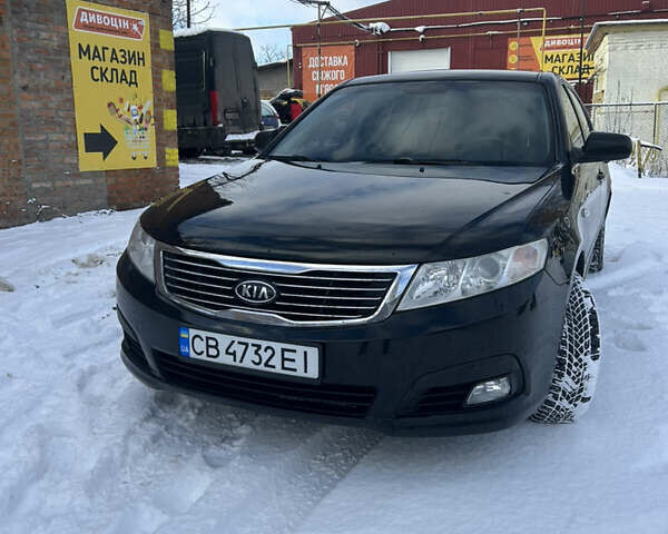 Чорний Кіа Маджентіс, об'ємом двигуна 2 л та пробігом 224 тис. км за 6500 $, фото 1 на Automoto.ua