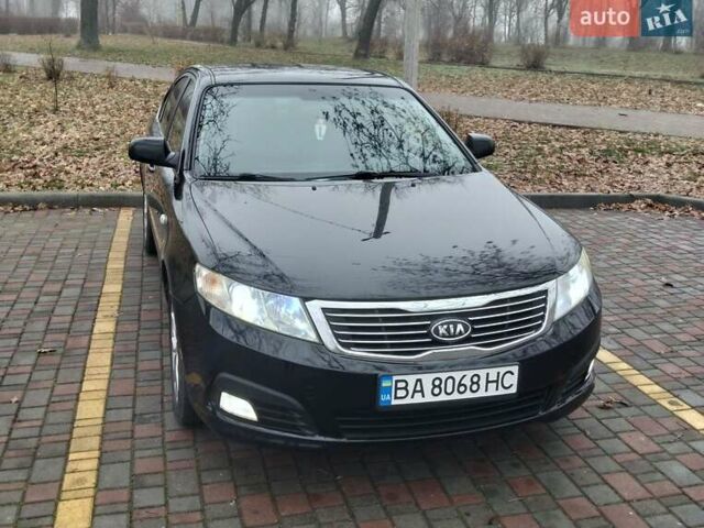 Чорний Кіа Маджентіс, об'ємом двигуна 2 л та пробігом 215 тис. км за 6700 $, фото 1 на Automoto.ua