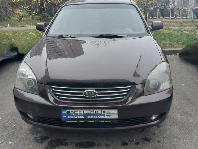 Коричневий Кіа Маджентіс, об'ємом двигуна 2 л та пробігом 355 тис. км за 4500 $, фото 1 на Automoto.ua