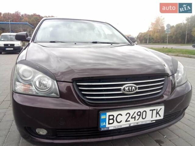 Коричневий Кіа Маджентіс, об'ємом двигуна 2 л та пробігом 241 тис. км за 4800 $, фото 1 на Automoto.ua