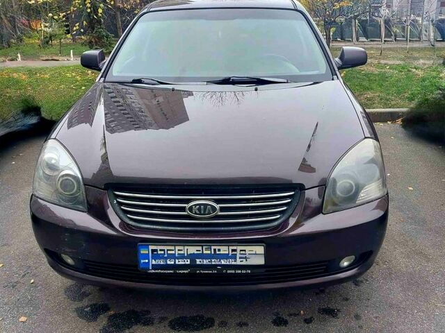 Коричневый Киа Маджентис, объемом двигателя 2 л и пробегом 355 тыс. км за 4500 $, фото 1 на Automoto.ua