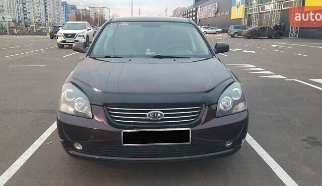 Коричневий Кіа Маджентіс, об'ємом двигуна 2 л та пробігом 278 тис. км за 5800 $, фото 1 на Automoto.ua