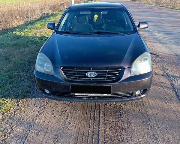 Коричневый Киа Маджентис, объемом двигателя 2 л и пробегом 256 тыс. км за 4600 $, фото 1 на Automoto.ua