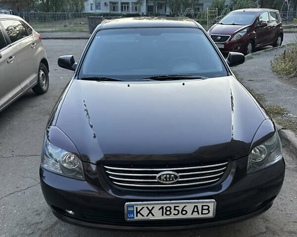 Коричневий Кіа Маджентіс, об'ємом двигуна 2 л та пробігом 180 тис. км за 5800 $, фото 1 на Automoto.ua