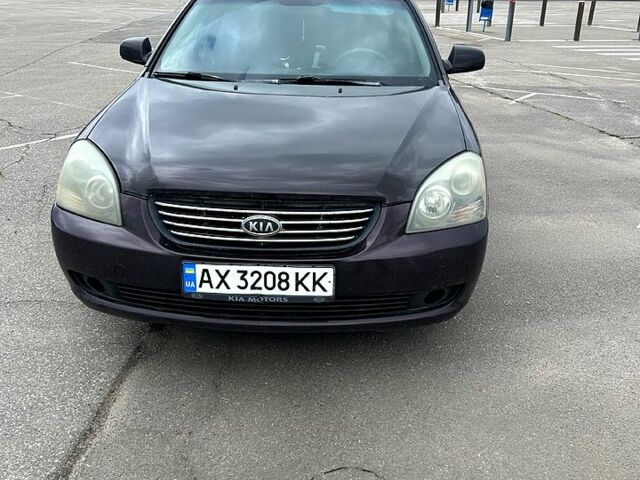 Коричневий Кіа Маджентіс, об'ємом двигуна 2 л та пробігом 320 тис. км за 5000 $, фото 1 на Automoto.ua