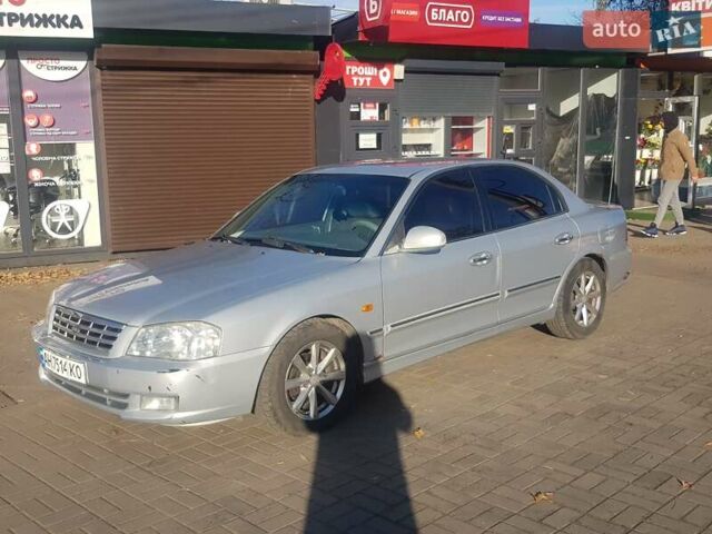 Сірий Кіа Маджентіс, об'ємом двигуна 2.5 л та пробігом 316 тис. км за 3750 $, фото 1 на Automoto.ua