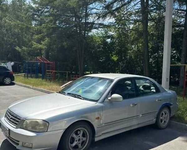 Сірий Кіа Маджентіс, об'ємом двигуна 2.5 л та пробігом 335 тис. км за 1800 $, фото 1 на Automoto.ua