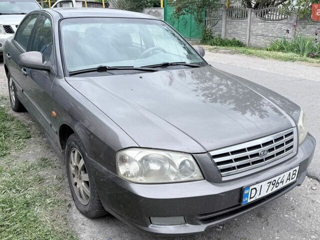 Серый Киа Маджентис, объемом двигателя 2 л и пробегом 346 тыс. км за 2500 $, фото 1 на Automoto.ua