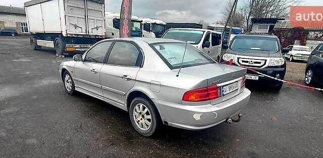 Серый Киа Маджентис, объемом двигателя 2 л и пробегом 290 тыс. км за 2700 $, фото 1 на Automoto.ua